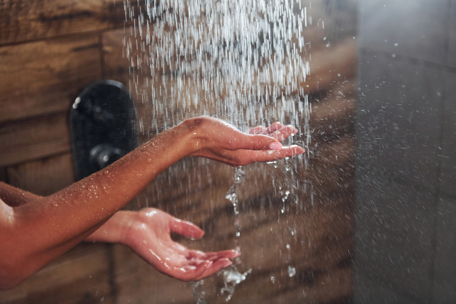 Hands in a shower.